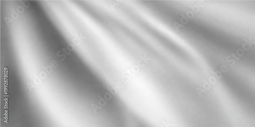 Smooth white and silver silk satin fabric texture with luxury flowing waves of soft gray metallic material creating a shiny light grey textile backdrop wallpaper design