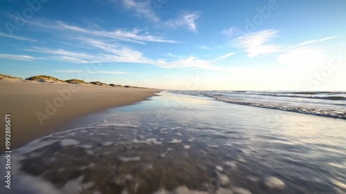 Desert dunes and waves aerial drone view golden sand beach