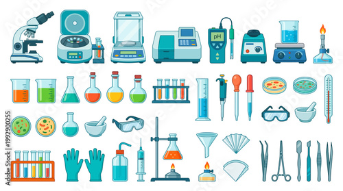 A laboratory setting with various science equipment and tools on a table indoors.