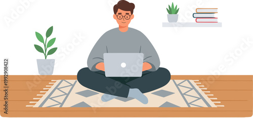 Man sitting on rug with laptop and plants around him in living room