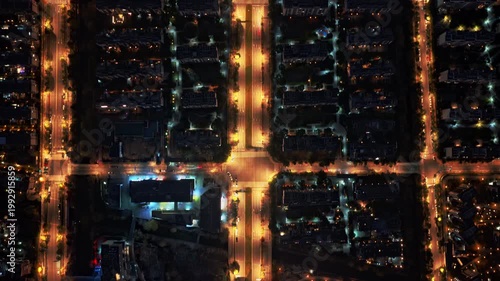 time lapse of traffic in modern city at night, aerial view