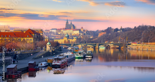 Old town of Prague, Czech Republic over river Vltava with Saint Vitus cathedral on skyline. Bright sunny morning. Praha panorama landscape view.