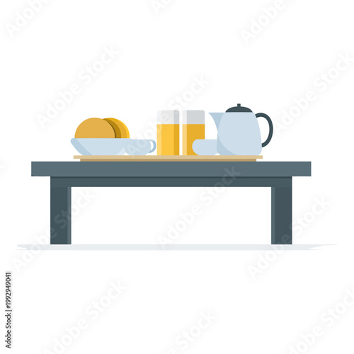 Minimal breakfast arrangement with teapot, cups and juice glasses on table, cozy home dining scene.