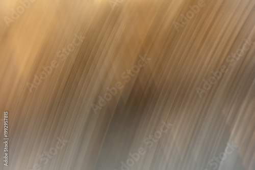 фотографія Abstract motion blur with diagonal streaks of ochre and sienna