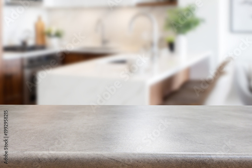 Empty wooden kitchen counter mockup, product display background. Wood table top on marble, blurred interior. Modern style home kitchen, restaurant advertising. Copy space