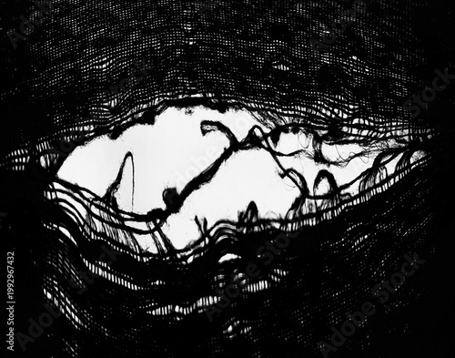 teared rag spread isolated on white background backdrop pattern texture. hole in tissue black fabric torn stitch hole loose threads Torn fabric with frayed edges Mockup mock up mock-up template blank