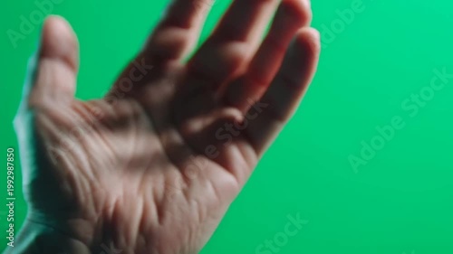 Human Hand Gesturing on Green Screen for Virtual Reality Interface Interaction.