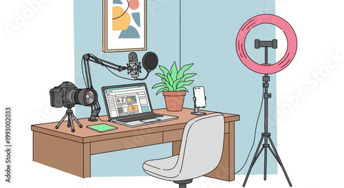 Home office workspace with laptop and recording equipment