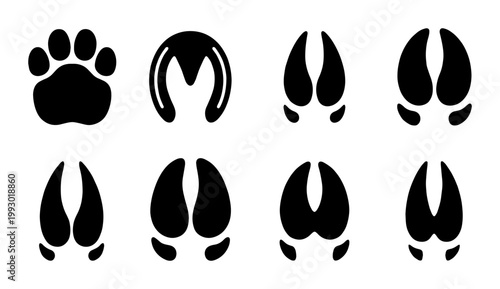 Animal track icons set, black paw print and hoof silhouettes, wildlife footprint vector collection, nature trail identification marks