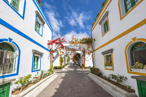 Puerto de Mogan typical colorful houses with flowers on Gran Canaria island holiday in Spain