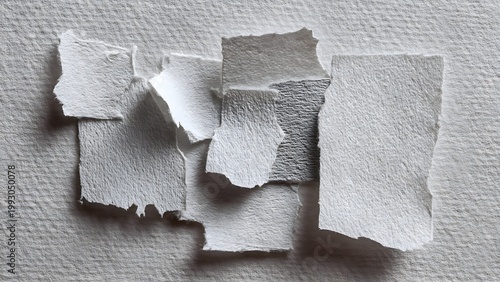 White torn paper texture on a clean background with rough vintage surface details
