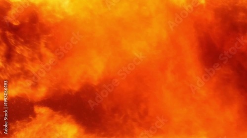 Intense raging fire blaze with glowing sparks and orange flames for abstract heat background