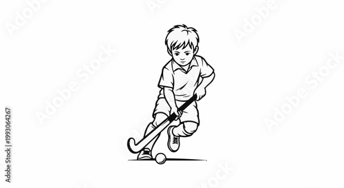 Child playing field hockey with determination