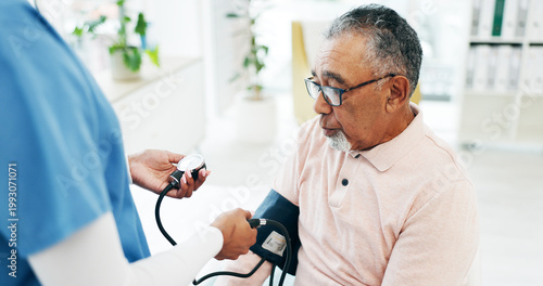 Senior, man and nurse with blood pressure machine in hospital with arm pump for exam. Elderly, male person or caregiver monitoring health on screening for hypertension, medical checkup or assessment