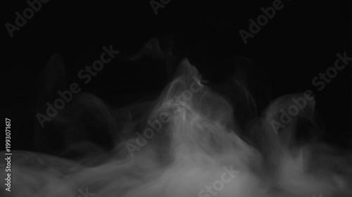 White smoke and steam rising against a black background for cinematic design
