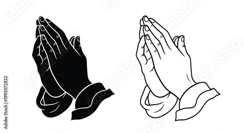 Praying hands depicted in contrasting black and white a striking silhouette