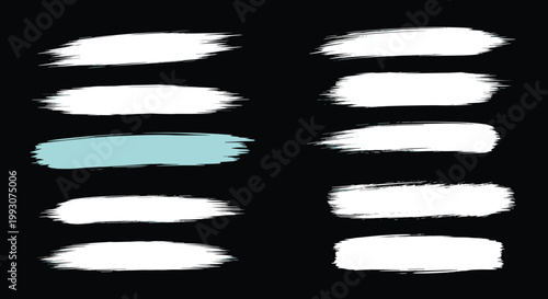 collection of horizontal paint brush strokes with one light blue accent set against a solid black background for design.
