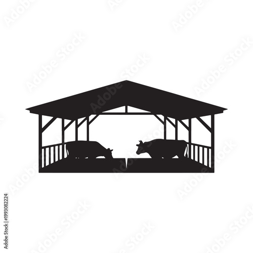 Black silhouette of cows resting under a simple barn structure