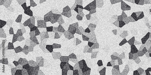 Abstract mosaic pattern with irregular geometric shapes and granular texture in grayscale tones creating a textured background for design and digital art applications