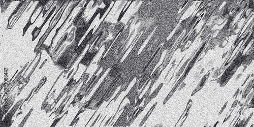 Textured monochrome abstract background with irregular diagonal brushstrokes and fine grain, offering a unique artistic pattern for creative projects and visual design