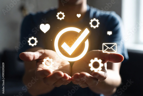 A person is holding glowing icons representing quality, progress, and communication, symbolizing approval or a successful outcome. It appears to be a digital workspace setting.