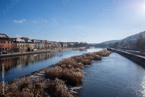 Main River flowing past old Würzburg cityscape in winter