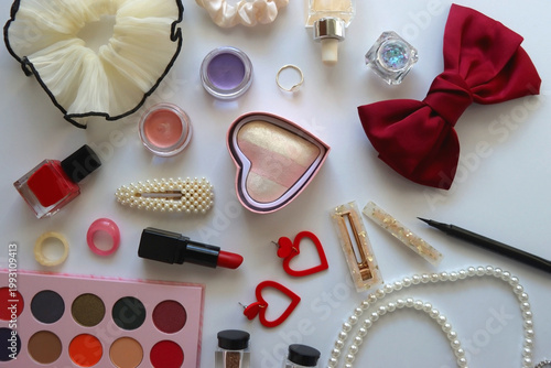 Various accessories and beauty products on white background. Coquette aesthetic. Flat lay.