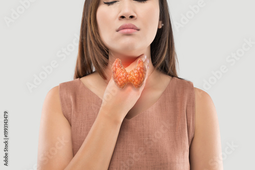 Woman touching her neck with a 3D thyroid highlighting thyroid cancer, hyperthyroidism, and related symptoms, isolated on a clean background