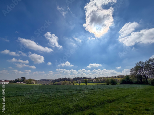 Schilderij op canvas Panoramic spring countryside landscape with dramatic clouds near Halle, België -