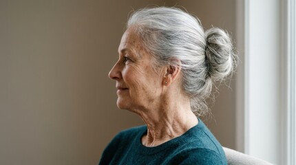 Senior Caucasian woman profile showing natural aging with gray hair in bun, wrinkles and neck skin detail, realistic mature beauty and dermatology concept on neutral background, soft light, no logos