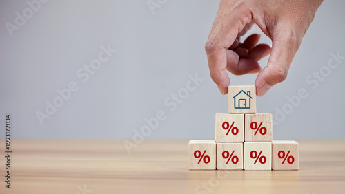 Property rates and real estate interest, interest rates, inflation, mortgage loans, tax increases. Increasing interest rates concept.