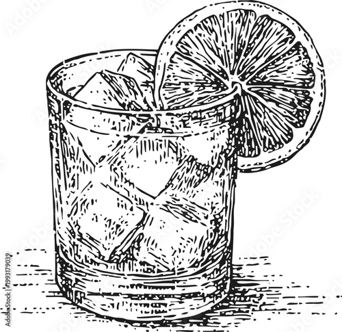Glass of iced beverage with lemon slice refreshing drink with ice cubes and citrus garnish in clear glass