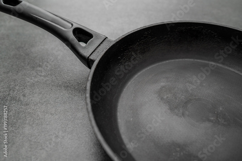 Φωτογραφία Close-up of Used Worn Frying Pan with Scratched Non-Stick Coating
