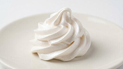 Close up of a beautifully piped white meringue swirl, soft glossy dessert texture with elegant peaks and clean minimal styling, bright studio light, appetizing detail, no logos