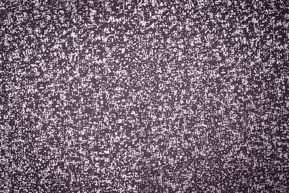 Fototapeta premium Simple fabric texture in shades of gray displayed on a flat surface during daylight