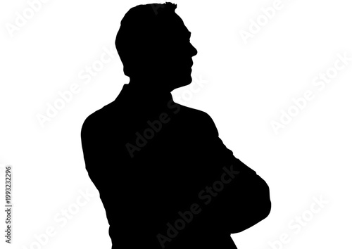 腕組みをするビジネスマンのシルエット
