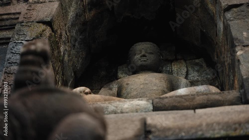 Cinematic footage of the iconic Borobudur Temple in Indonesia. Majestic stone stupas, ancient carvings, and serene atmosphere create a powerful spiritual and cultural scene.