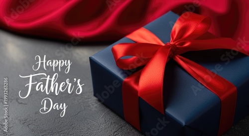 Happy father's day a beautiful gift box with red ribbon for dad's special day