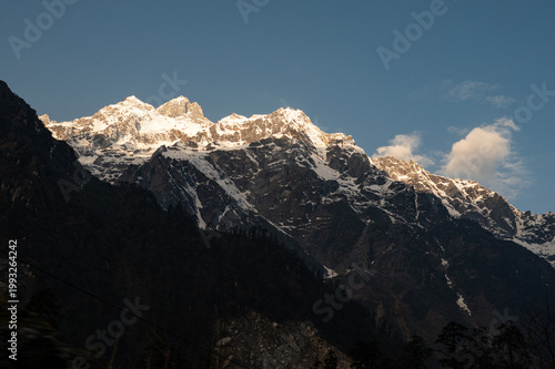 The sunrise has kissed the mountain of Lachung, North Sikkim, India. 