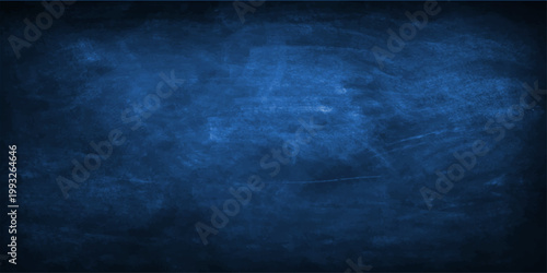 A dark blue grunge blackboard texture reminiscent of a stormy night sky with swirling smoke, faint moon light, and deep sea water clouds
