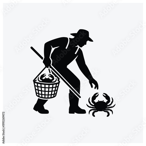 Silhouette of fisherman catching crab by the sea