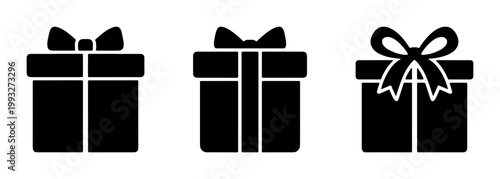 Minimalist gift box icons set, black silhouette present symbols with ribbons and bows, collection of 3 vector gift box elements for holiday marketing
