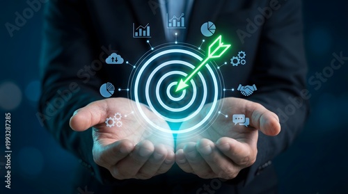 Augmented reality bullseye target with a green arrow hitting the mark hovering over open hands of a professional in a navy suit, featuring a luminous array of business performance icons.