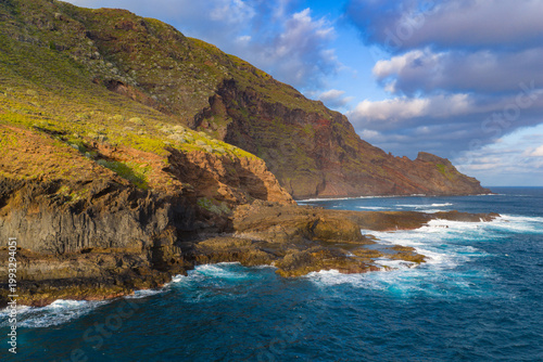 Aerial View of La Fajana Lighthouse and Coastal Banana Plantations at Sunrise; Maritime Infrastructure, Industrial Agriculture, and Solar Azimuth, La Palma, Canary Islands, Spain