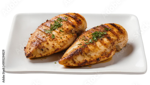 Fotografía Grilled chicken breasts with herbs on white ceramic plate