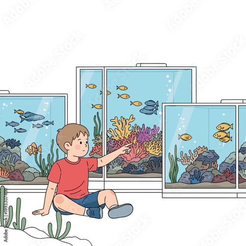 Boy looking at fish aquarium closely.