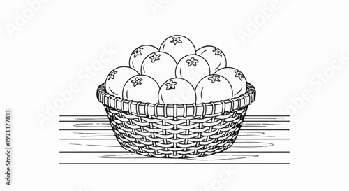 Black and white sketch of a woven basket overflowing with round fruits on a striped surface