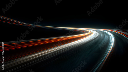 Dynamic light trails from moving vehicles on a curved road at night long exposure photography