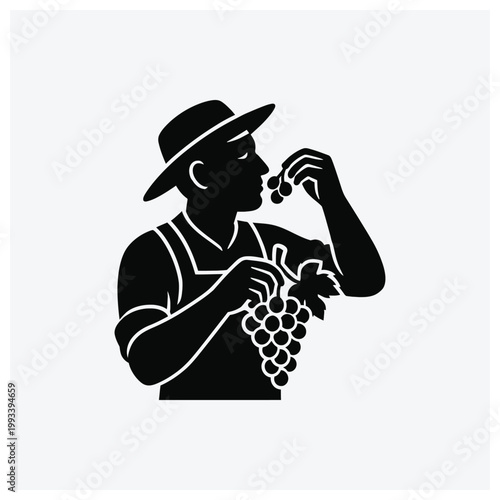 Man picking grapes silhouette icon