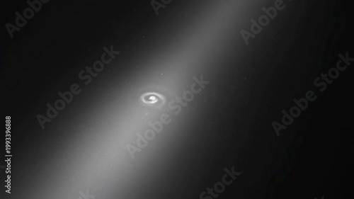 The video showcases a sequence of frames capturing a celestial scene, primarily focusing on a spiral galaxy set against the backdrop of space